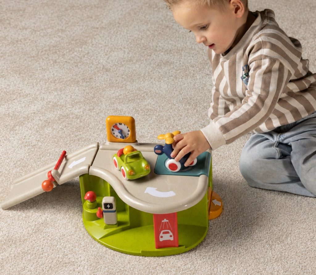 Children playing with Tolo toys